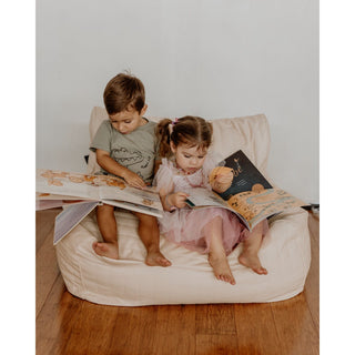 Close-up of Ivory vegan leather beanbag loungers, showing the soft, quilted texture and comfortable design